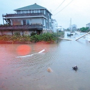 JILL CONNOR / SunPhotos Hurricane Sandy  Last year's Hurricane Sandy floods portions of Crandall and Atlantic avenues in Misquamicut.